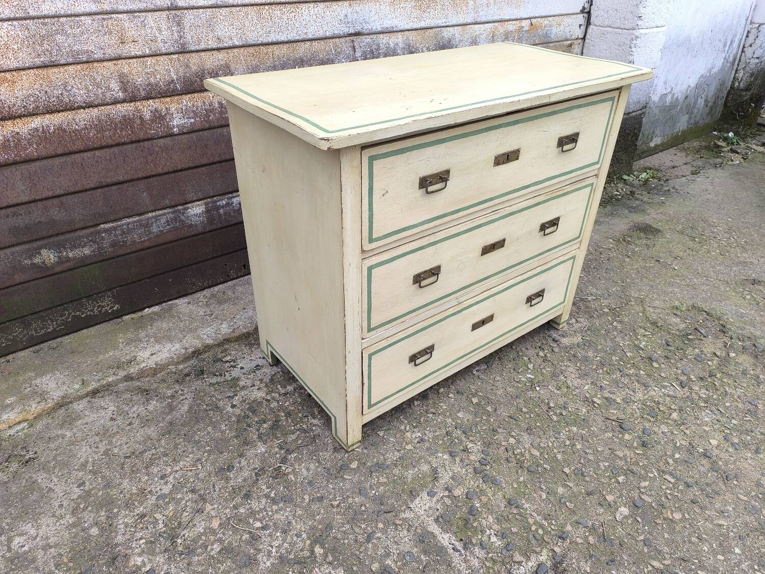 4-drawer chest of drawers with yellow and green patina by a local artist