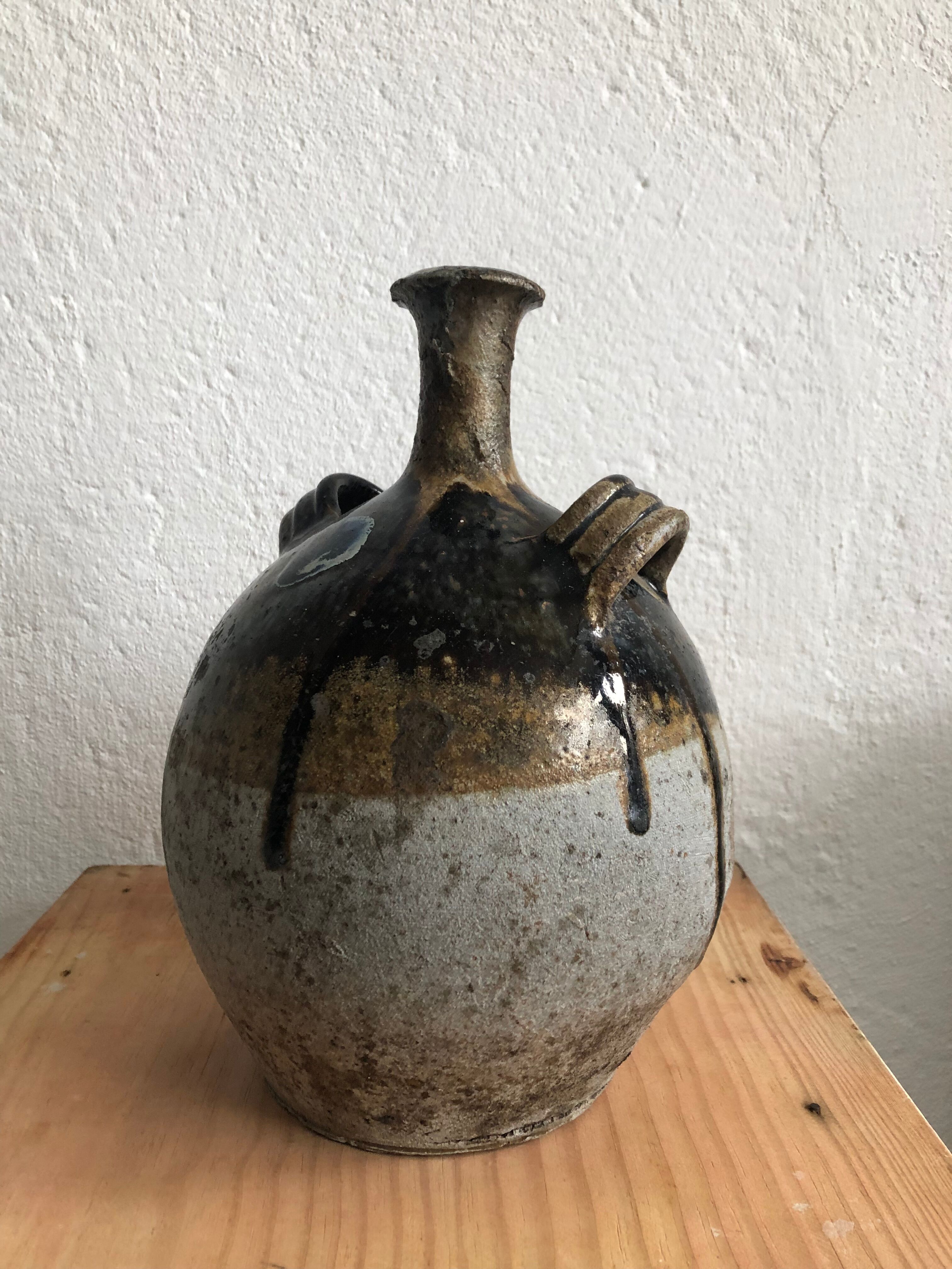Old glazed terracotta jar