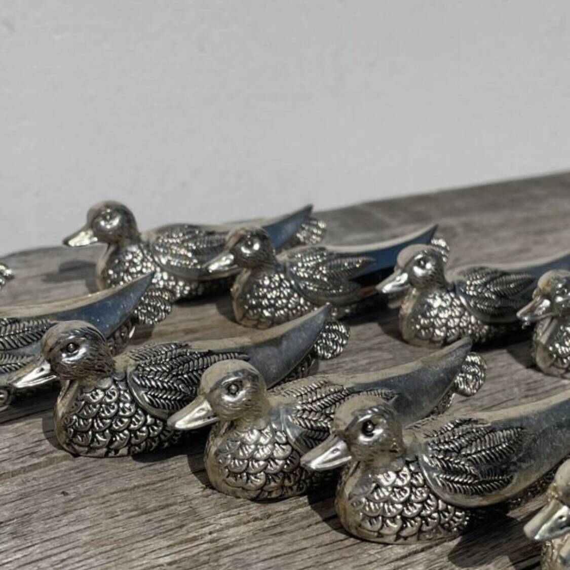 12 silver-plated metal knife rests with duck design