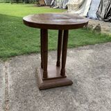 1930s Art Deco round side table in painted brown wood — column leg base