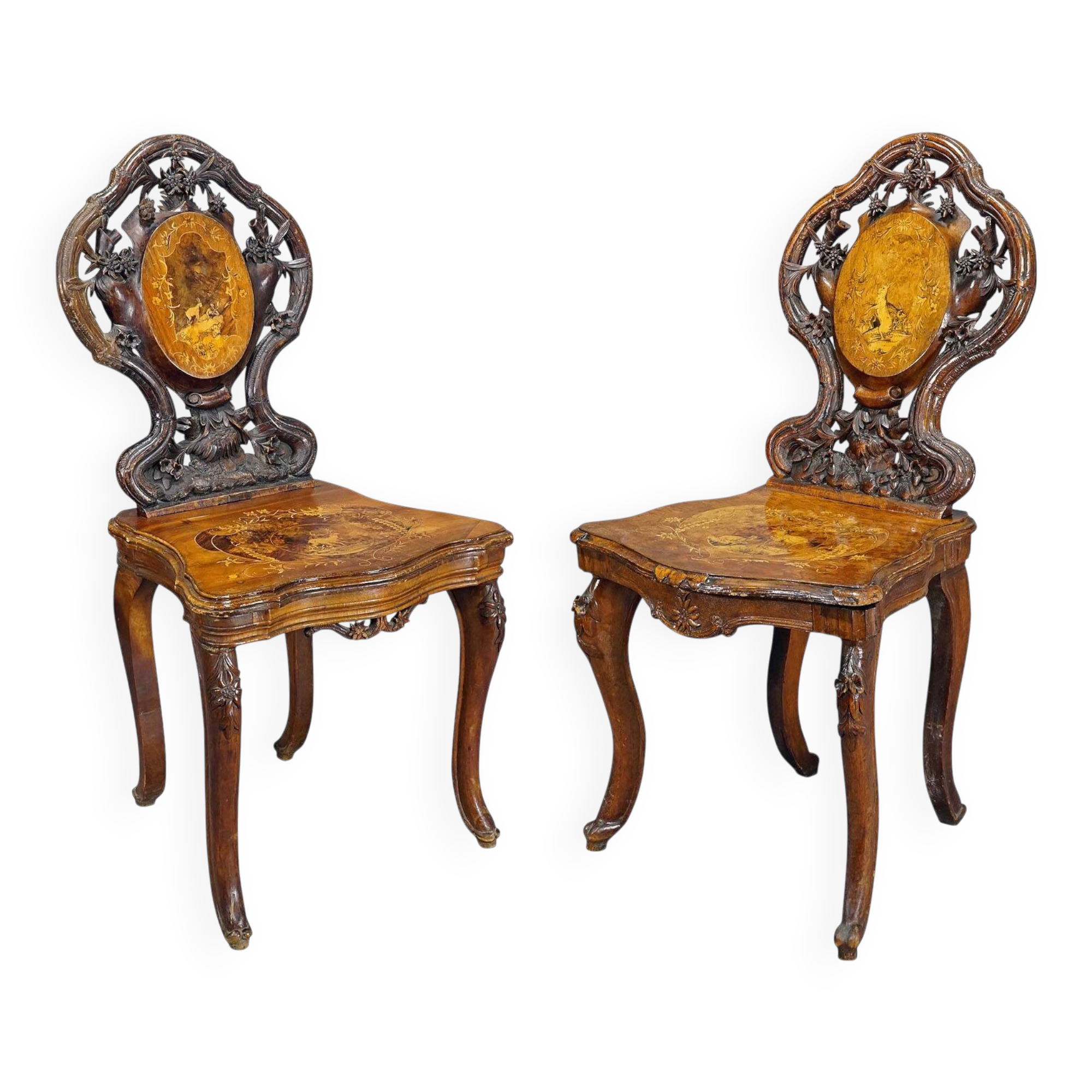 Pair of walnut chairs with Edelweiss marquetry, Brienz Switzerland 1900