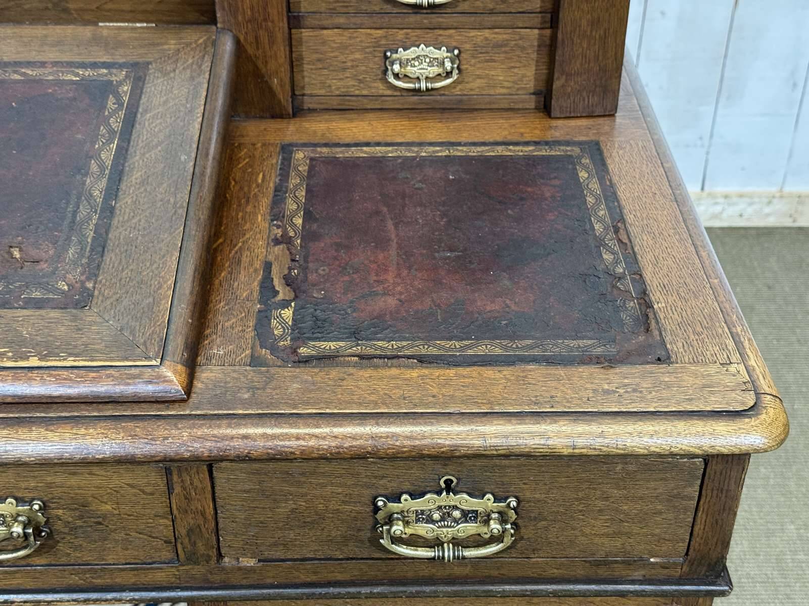 English oak graduated desk from the late 19th century.