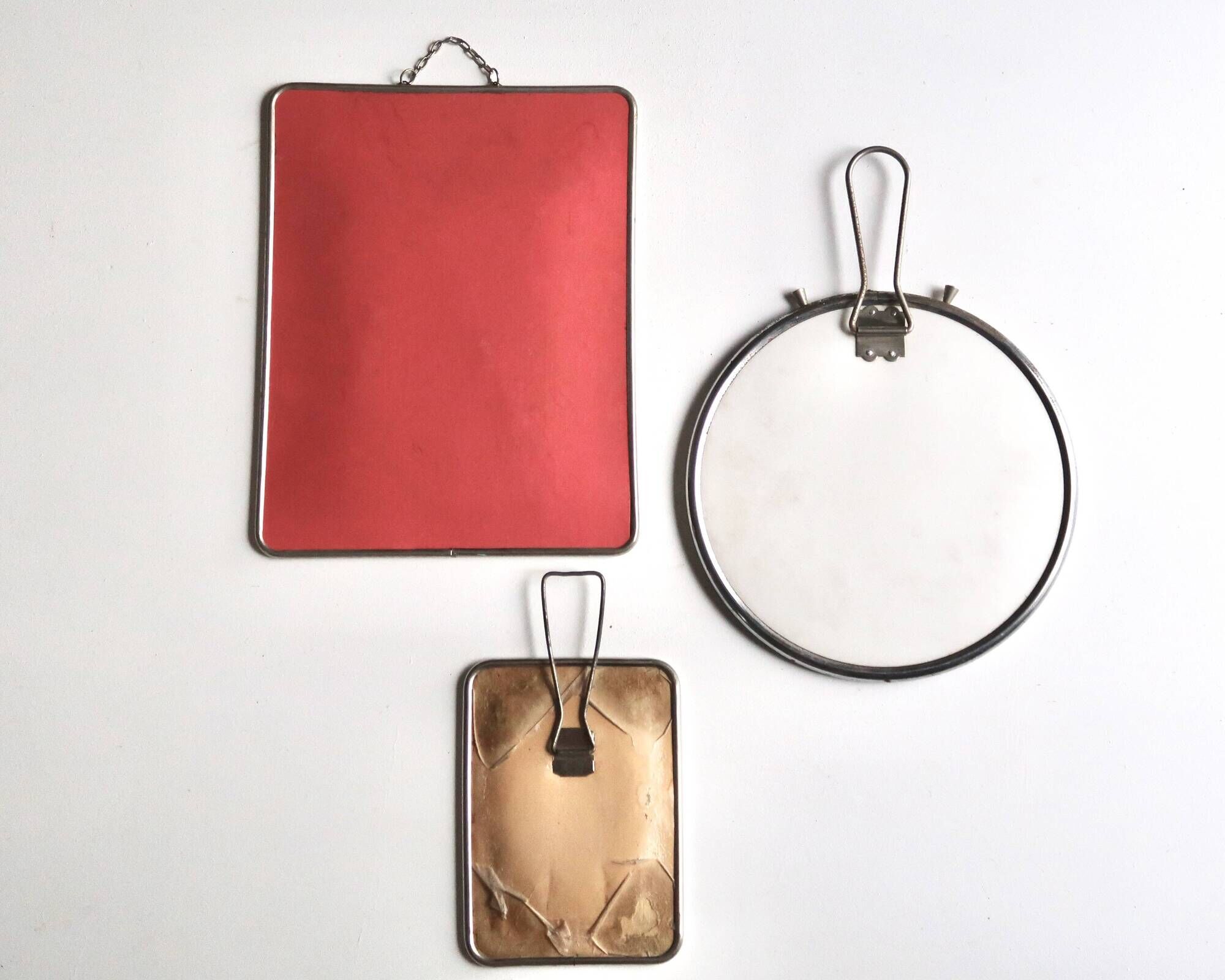 Set of 3 rectangular and round magnifying barber mirrors, 1950s.