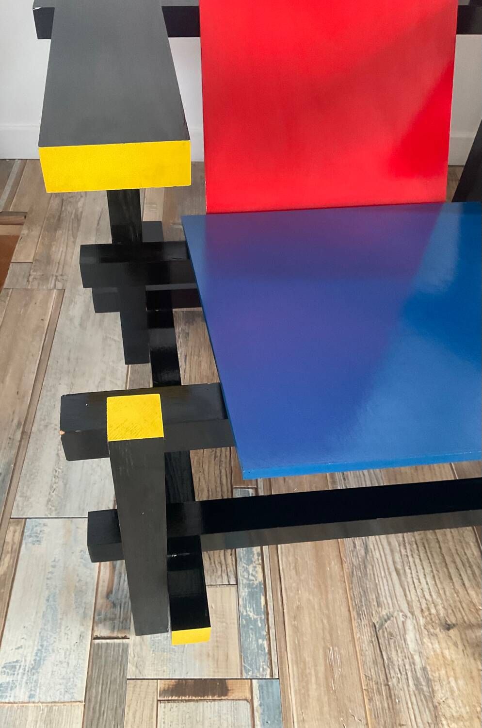 “Red and blue” lounge chair in the style of Gerrit Rietveld