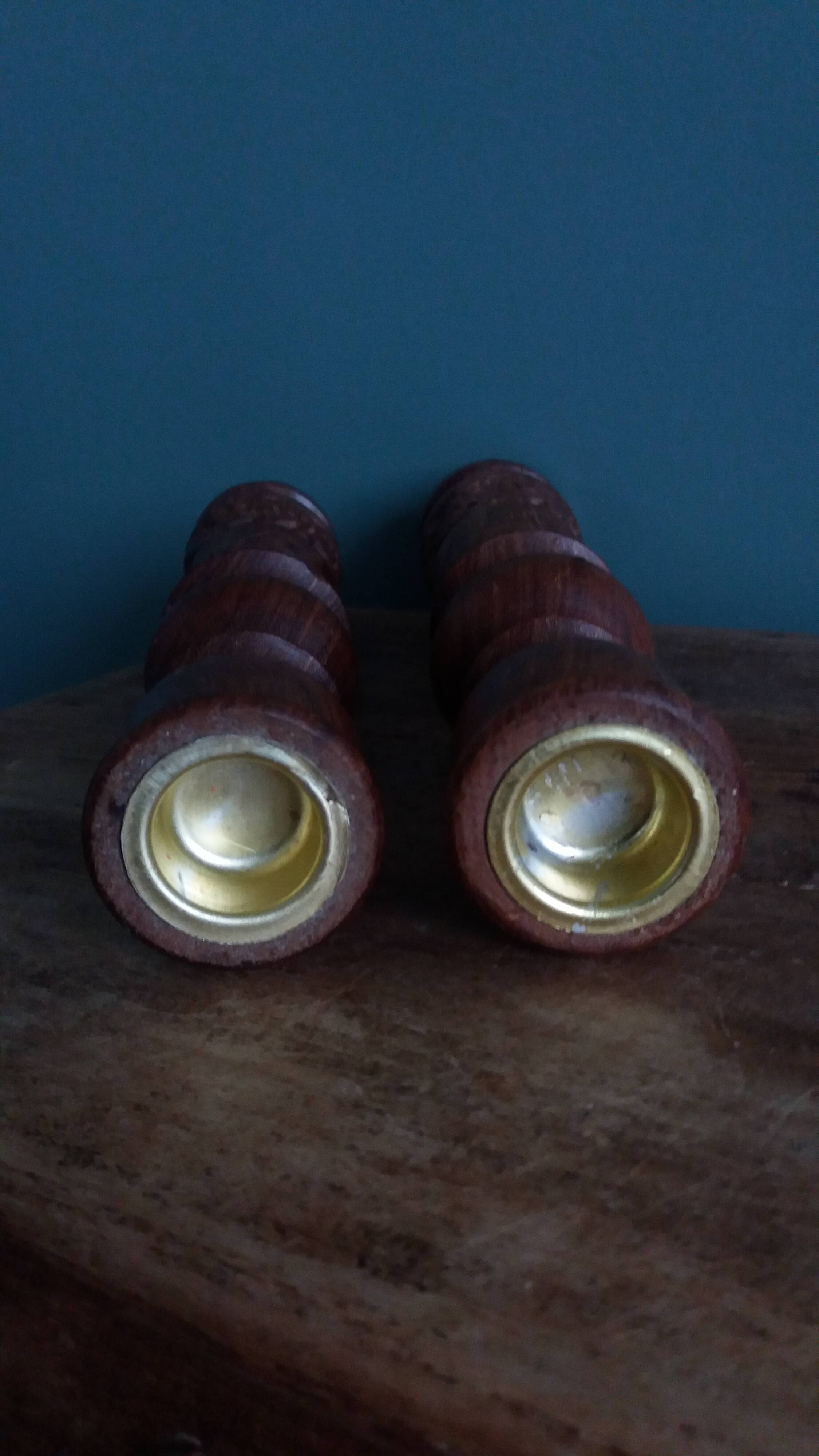 Bohemian candle holders made of turned and carved wood.
