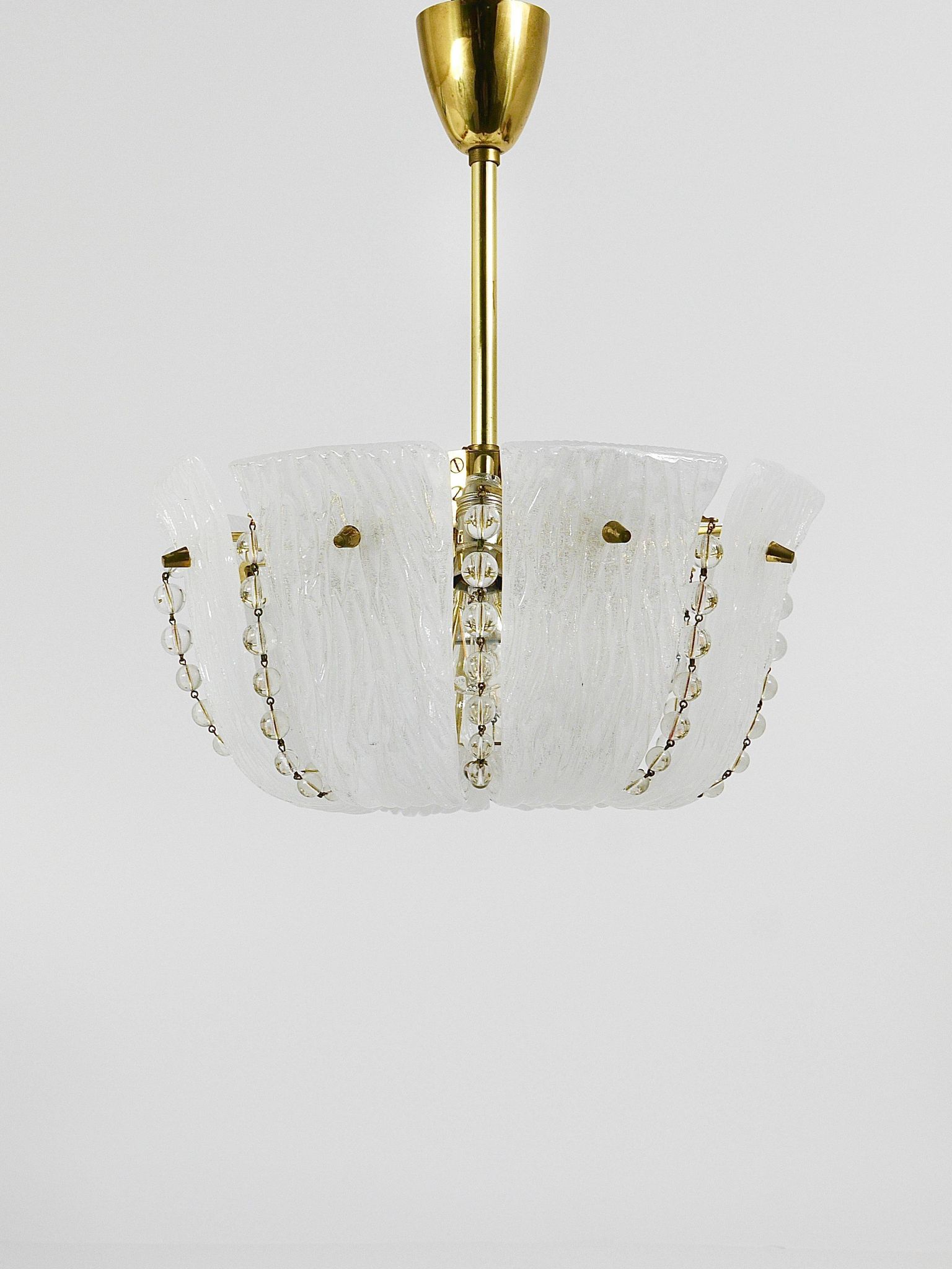 J.T. Kalmar Petite curved suspension basket, brass and glass, Austria, 1950s
