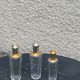 Three bottles of crystal perfume signed Marcel Rochas old france