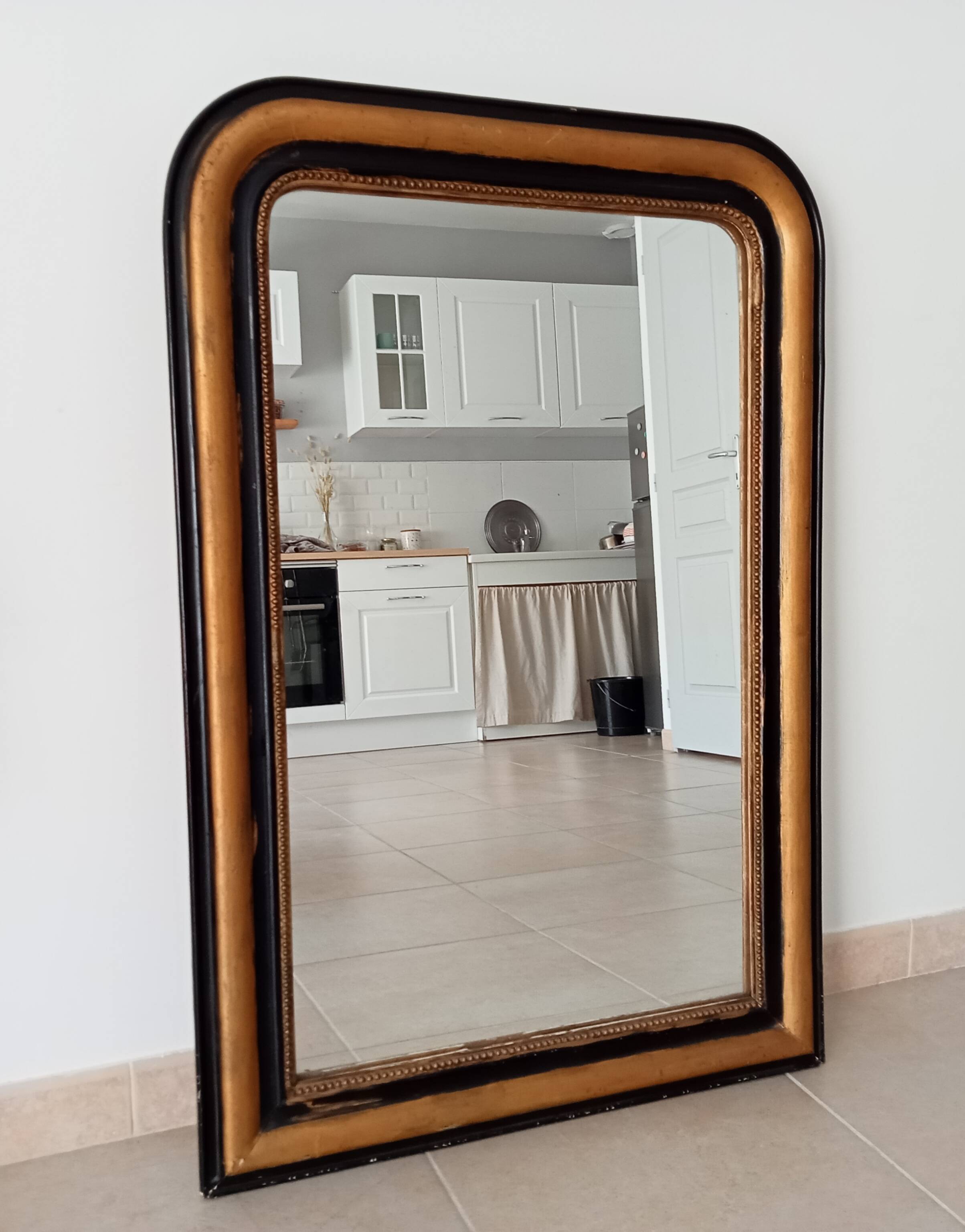 Louis Philippe mirror 105*71cm in wood and stucco 19th century
