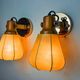 Pair of articulated "Cocoon" wall lights, resin and pine, Italy, 1970
