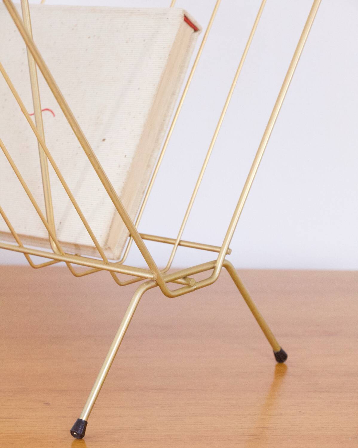 Vintage golden magazine rack