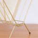 Vintage golden magazine rack