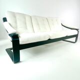 Three-seater sofa, removable cushions reupholstered in white teddy, circa 1970