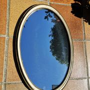 Ancien miroir ovale guilloché doré et peint