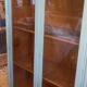 Green patina wooden display cabinet
