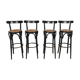 Suite de 4 tabourets de bar en cannage et bois noirci