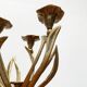 Vintage brutalist floral metal candlestick