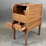 EAGLE in Paris. Wooden archive cabinet opening with two drawers and a curtain.