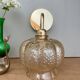 Vintage golden globe angled wall light in amber glass