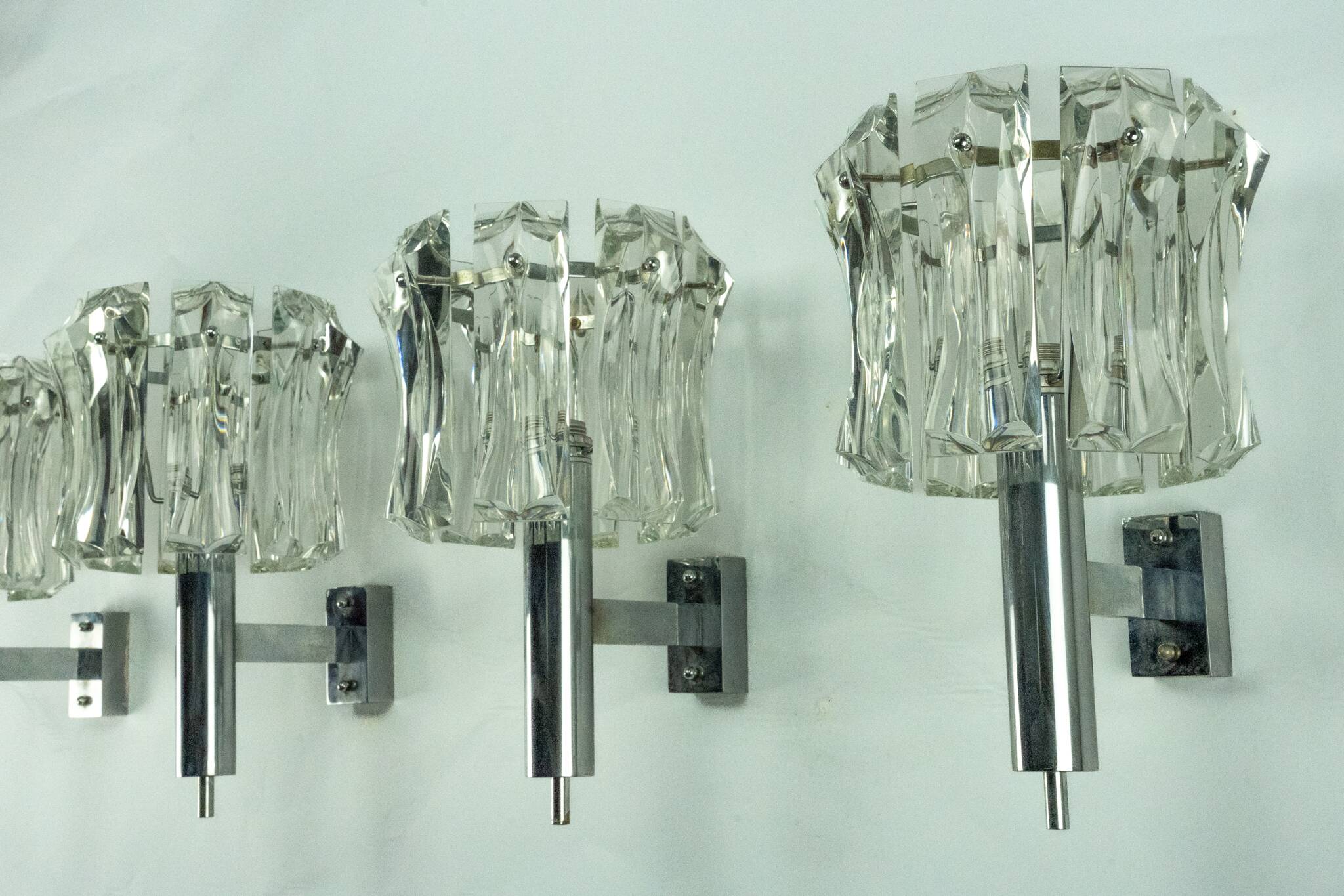 Set of four large Murano glass elements and chromed brass sconces, Italy 60