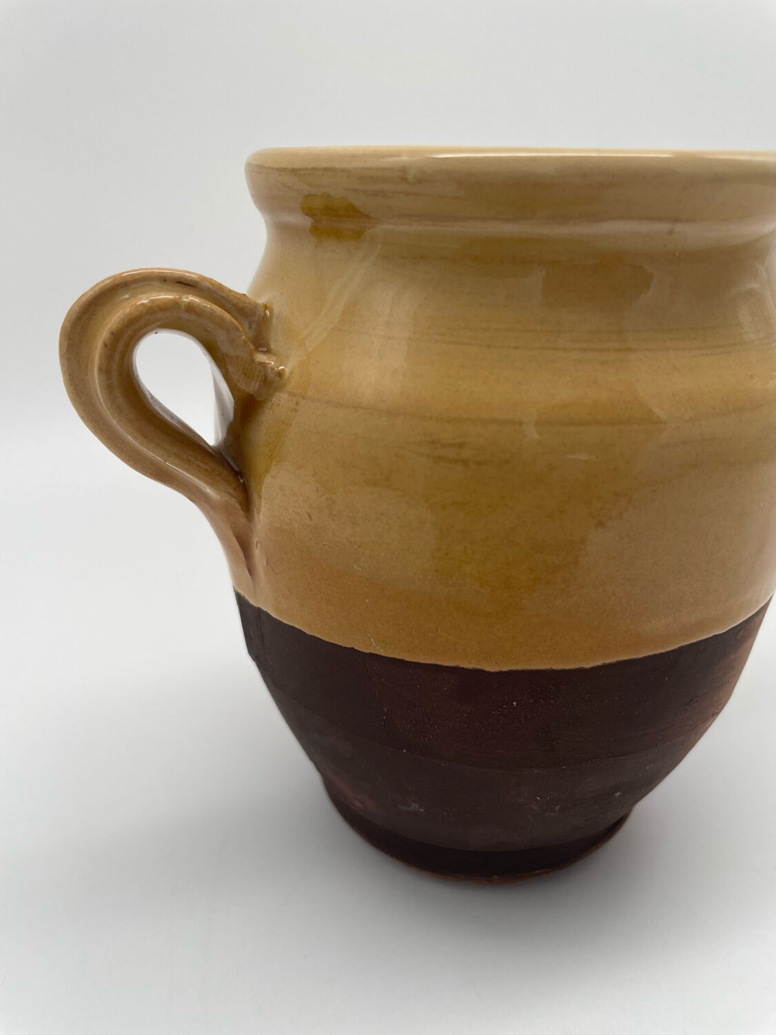 Varnished yellow terracotta confit pot