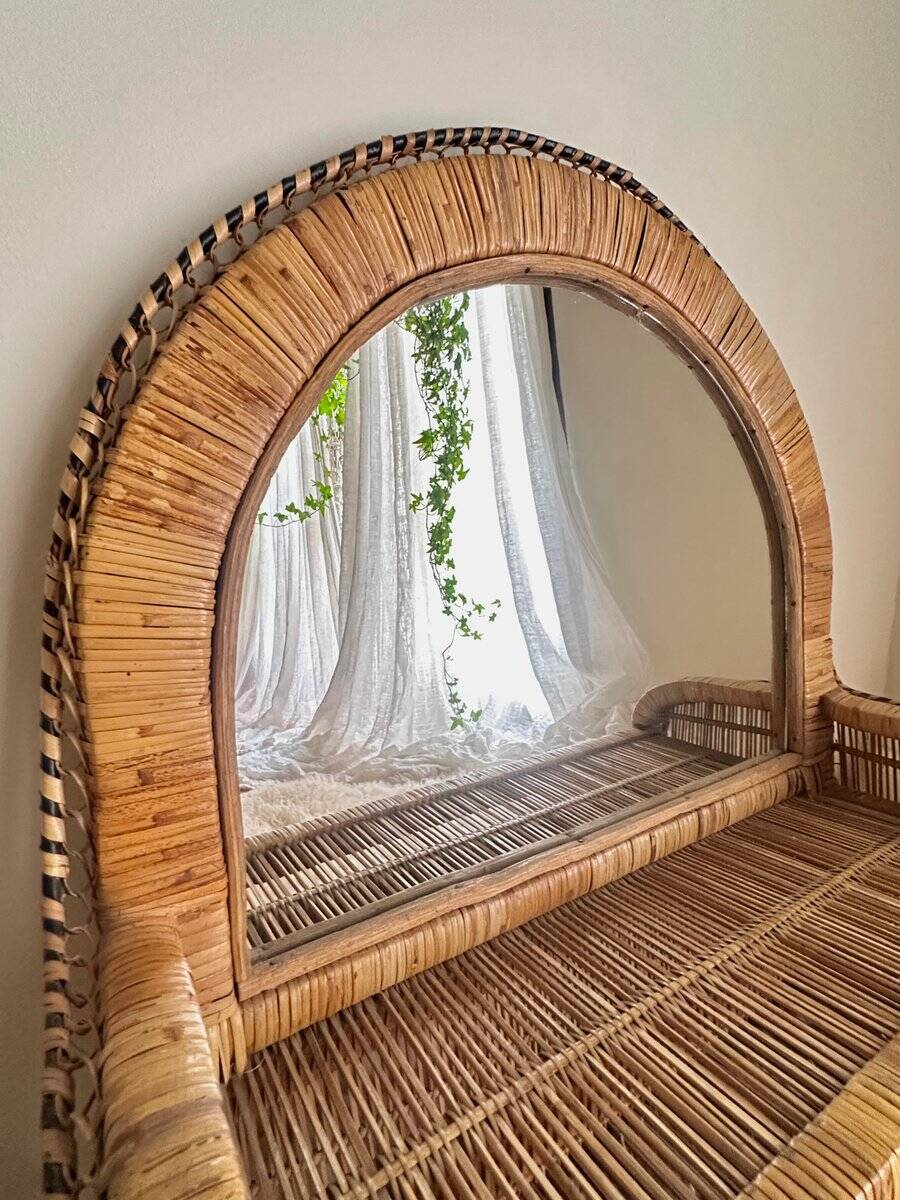 Woven rattan and wicker shelf mirror in the Emmanuelle style, Spain, 1970s.