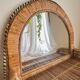 Woven rattan and wicker shelf mirror in the Emmanuelle style, Spain, 1970s.