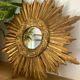 Miroir soleil doré convexe