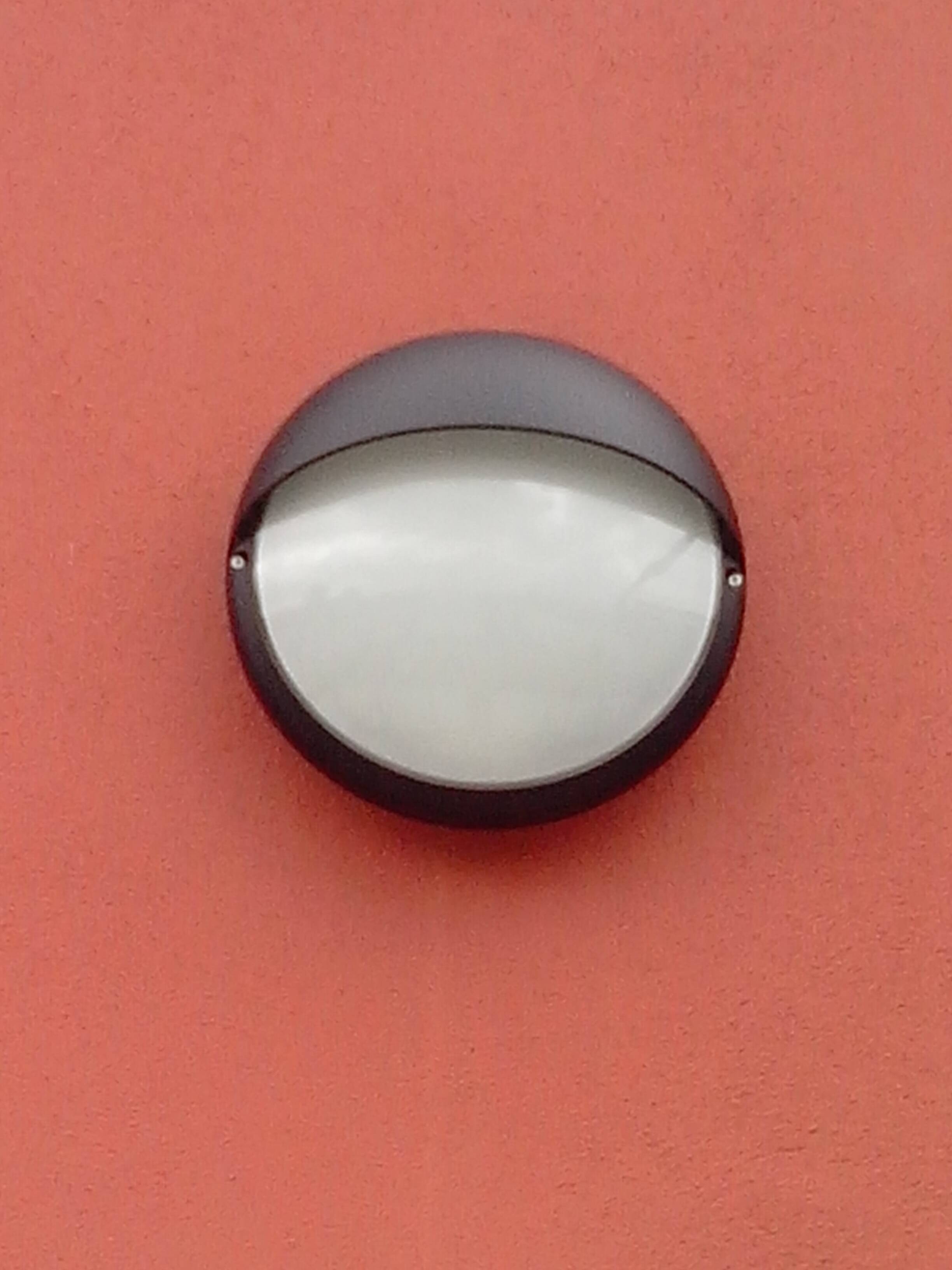 Compact Hublot wall light L’Ebénoid