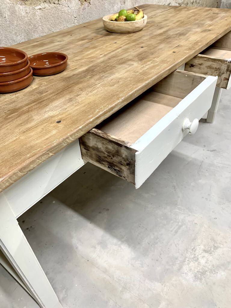 Farm table with off-white legs.
