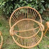 Pair of rattan shell armchairs steel feet