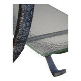 Decorative shelf unit, round metal frames with curved legs and glass shelves, 1960.