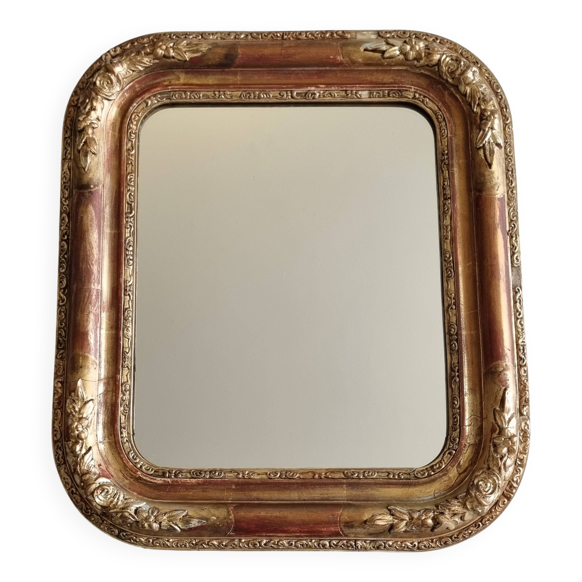 Miroir Louis-Philippe en bois et stuc doré à décor floral, XIXe,  43x38 cm