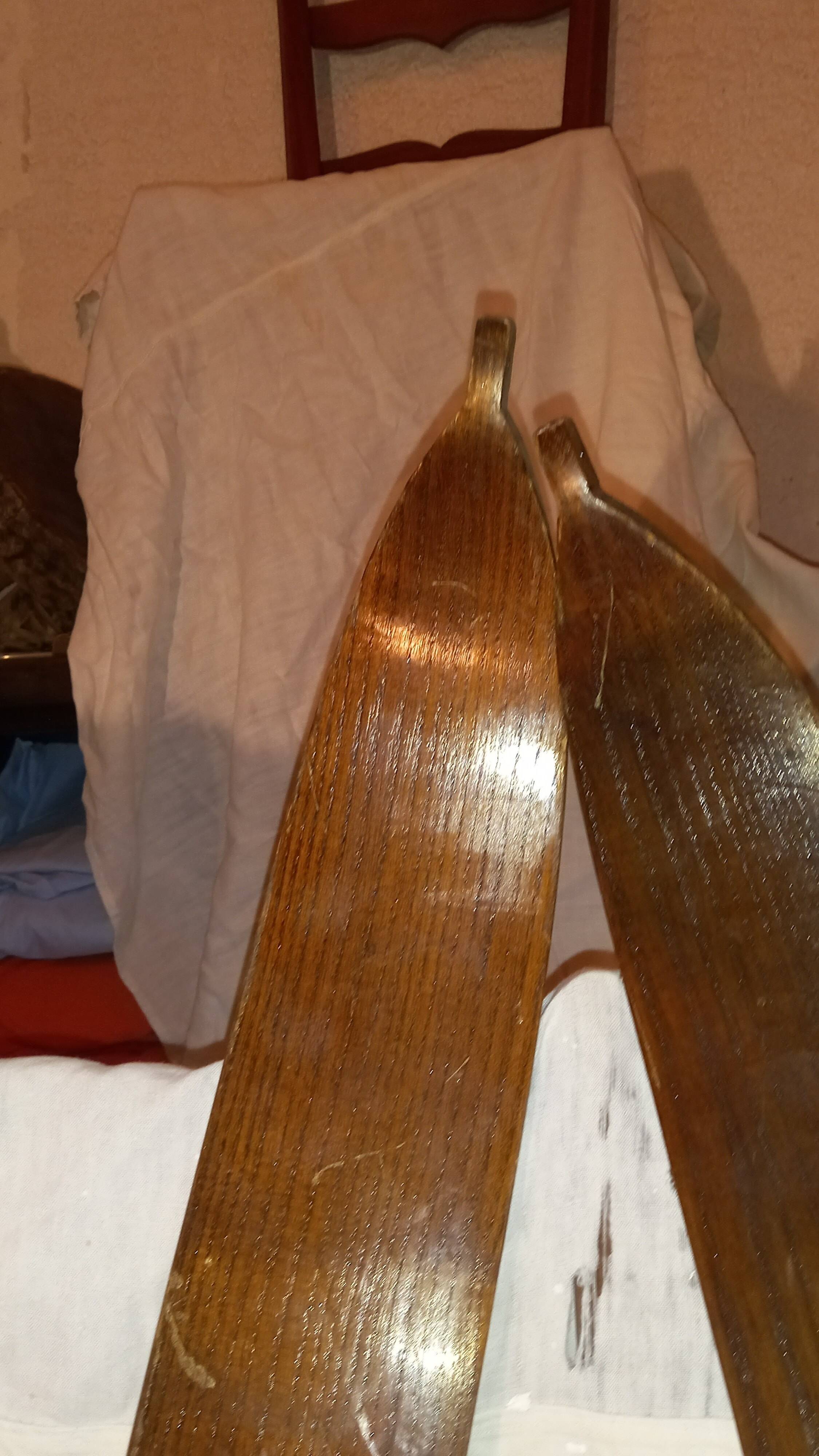 Pair of vintage wooden Skis and their poles + shoes.