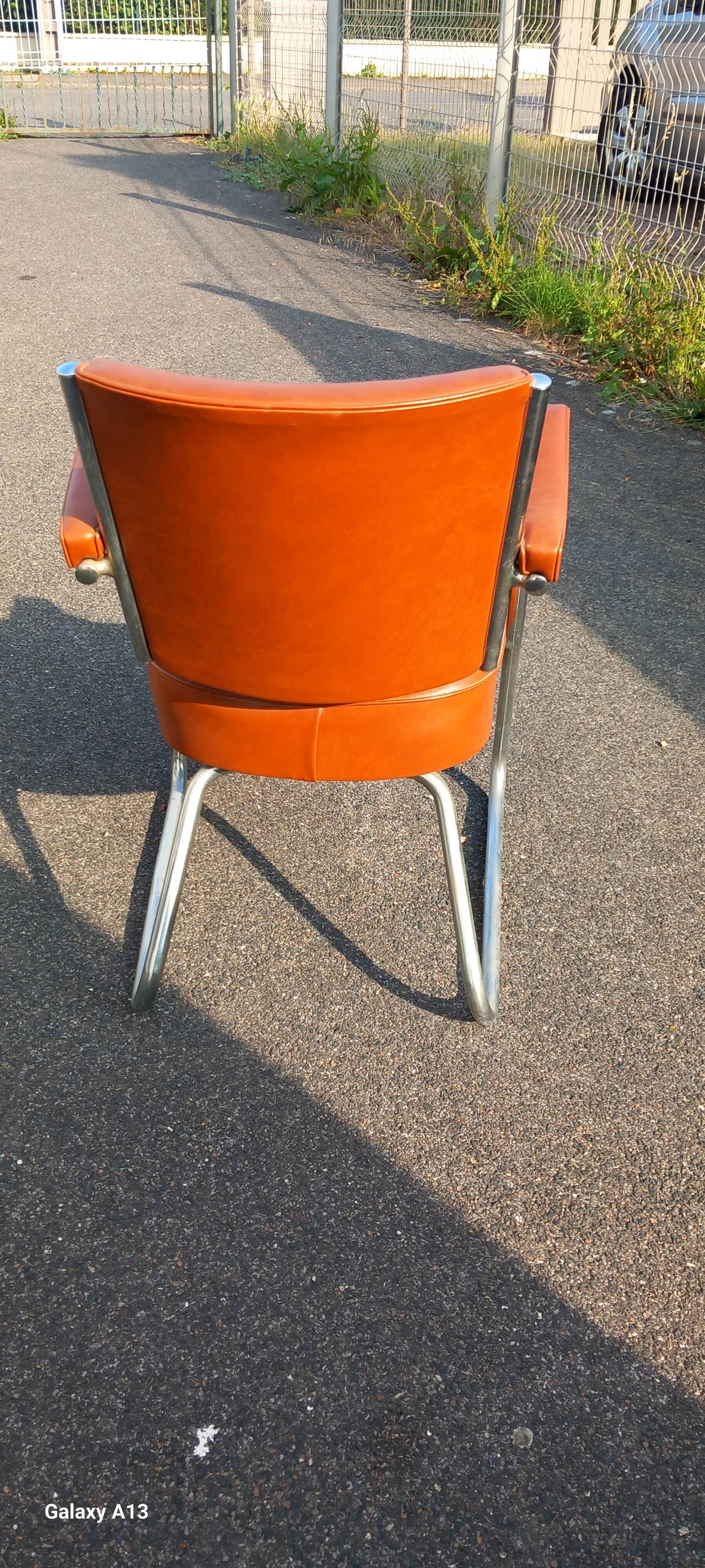 Vintage leatherette and chrome armchair