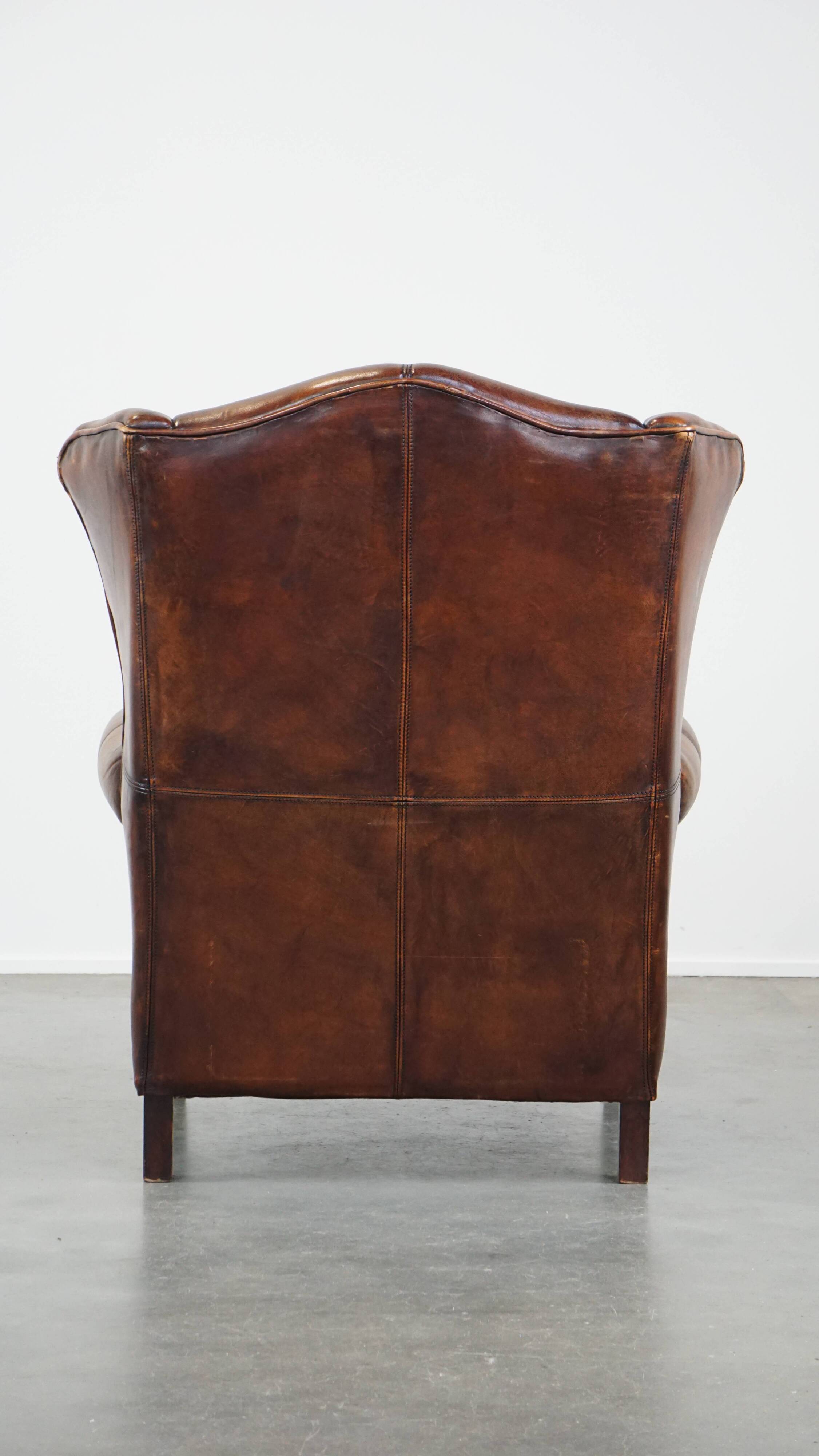 Fauteuil à oreilles en cuir de mouton