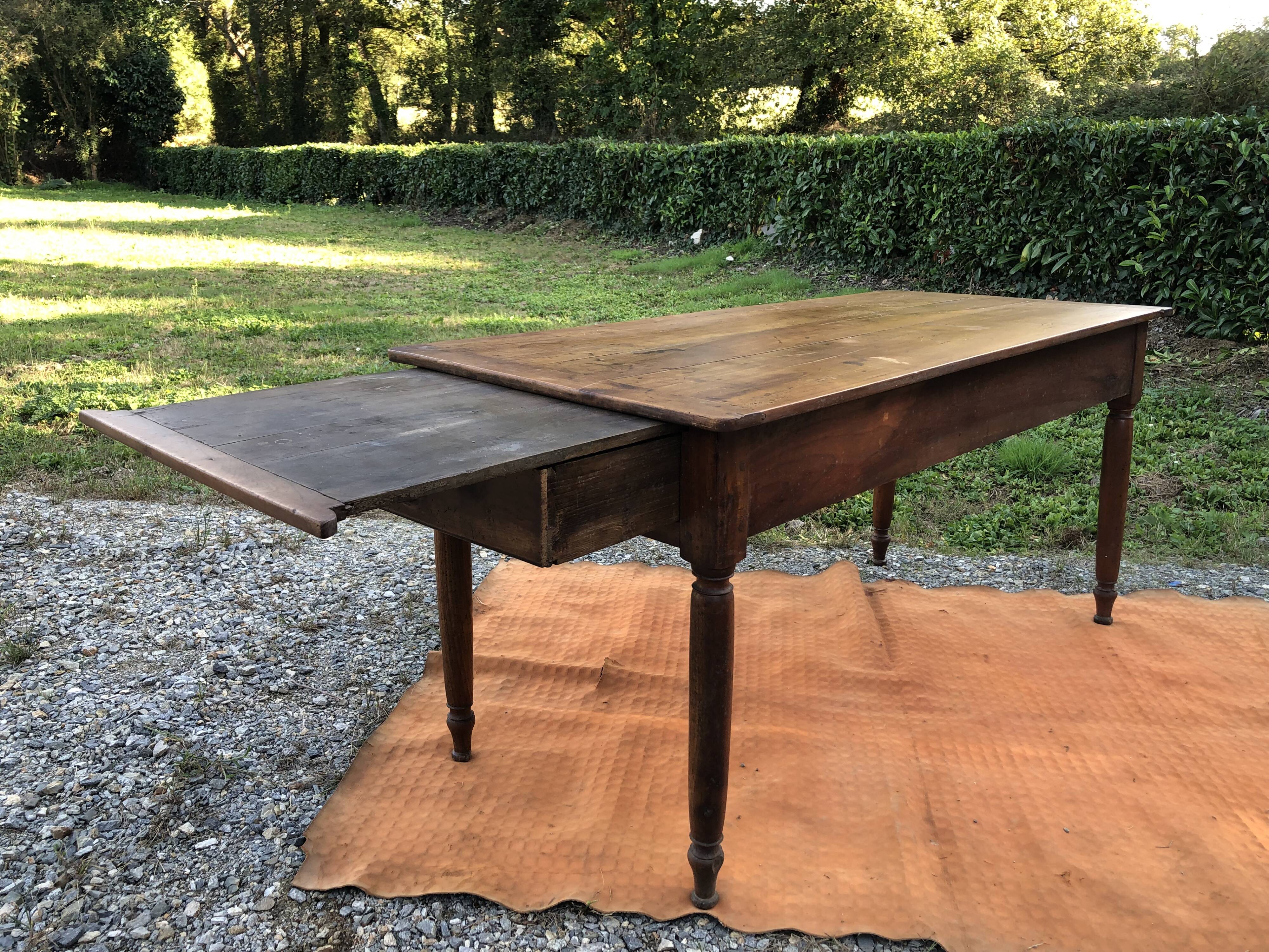 Antique cherry wood farm table with turned base with 2 drawers and 1 pull