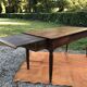 Antique cherry wood farm table with turned base with 2 drawers and 1 pull