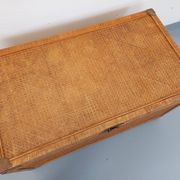 Vintage trunk in wood, rattan, caning, and brass.