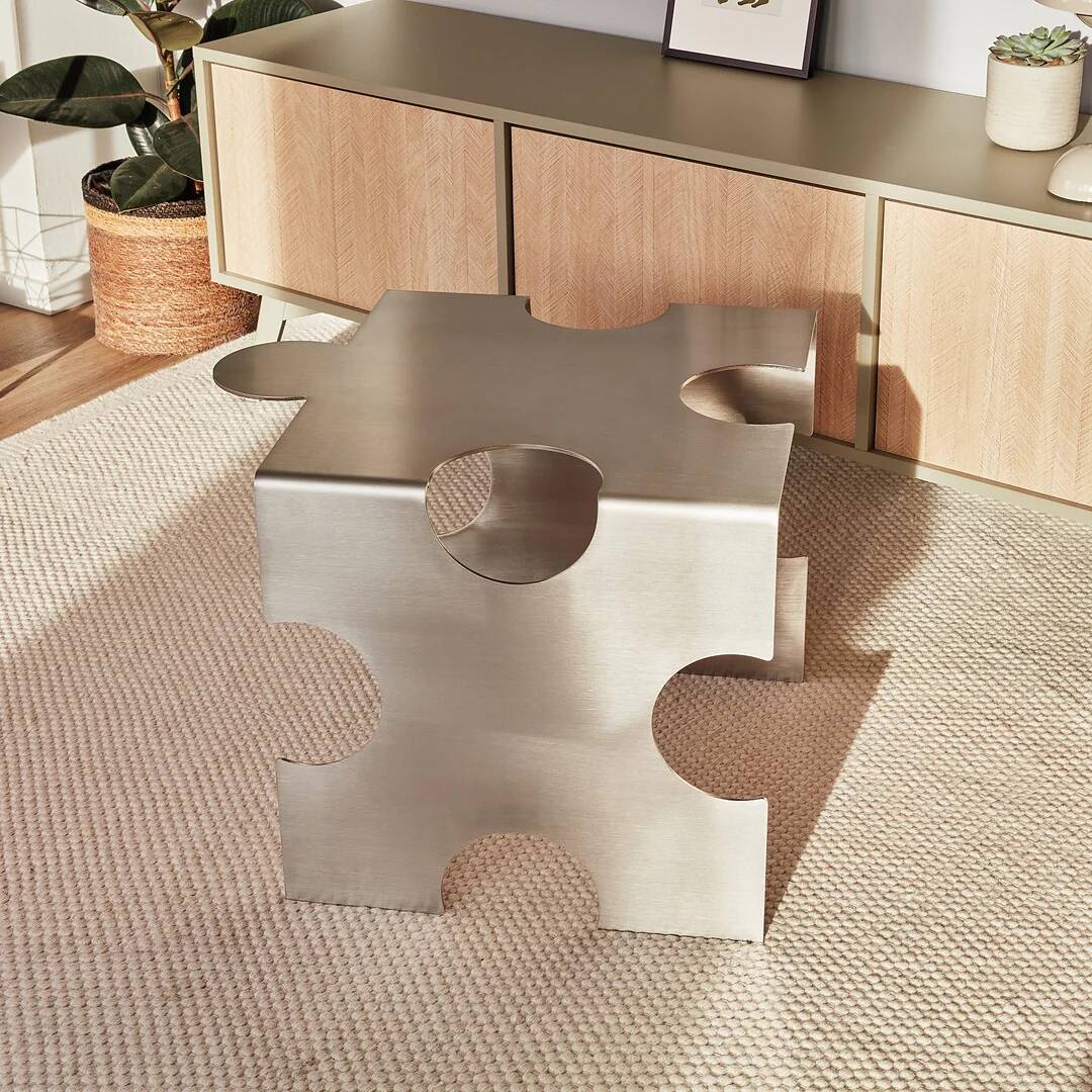 Puzzle - table basse sculpturale en acier inoxydable par Veliento
