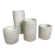 Four white earthenware candle holders