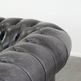 Black chesterfield 3-seater sofa made of cowhide leather in English style