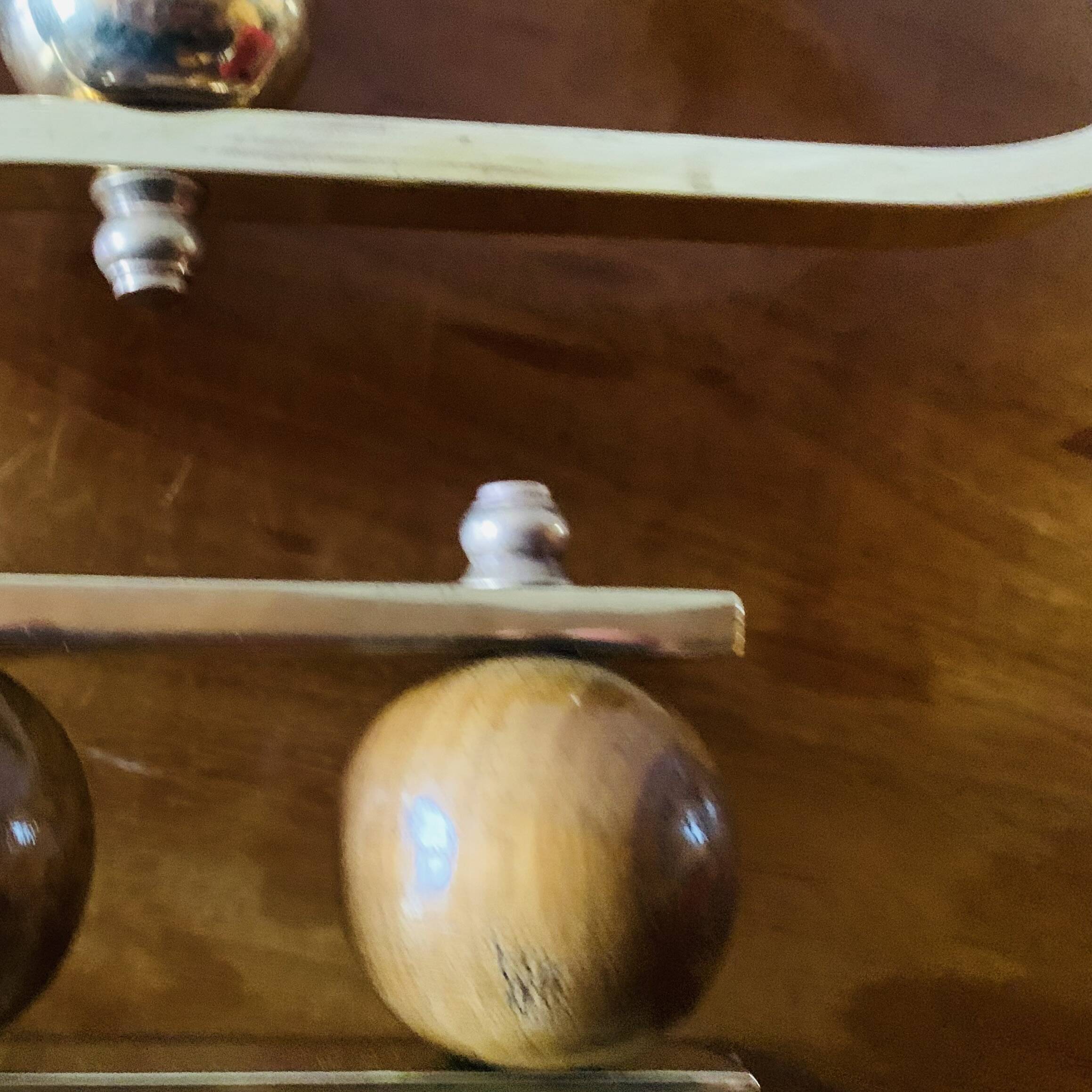 Pair of Art Deco candlesticks in gilded brass and wood