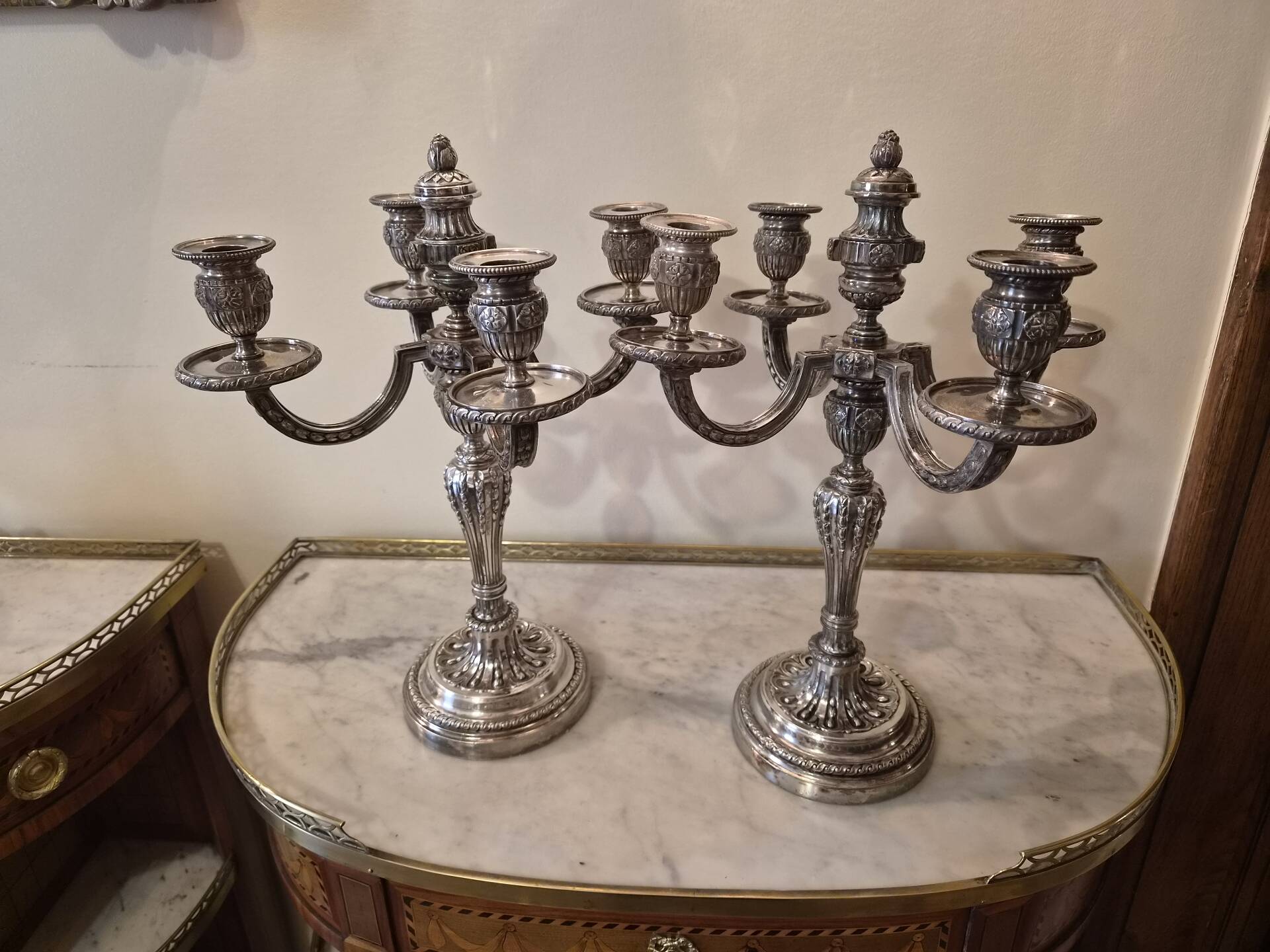 Pair of four-light candelabra in silver-plated metal in Louis style.