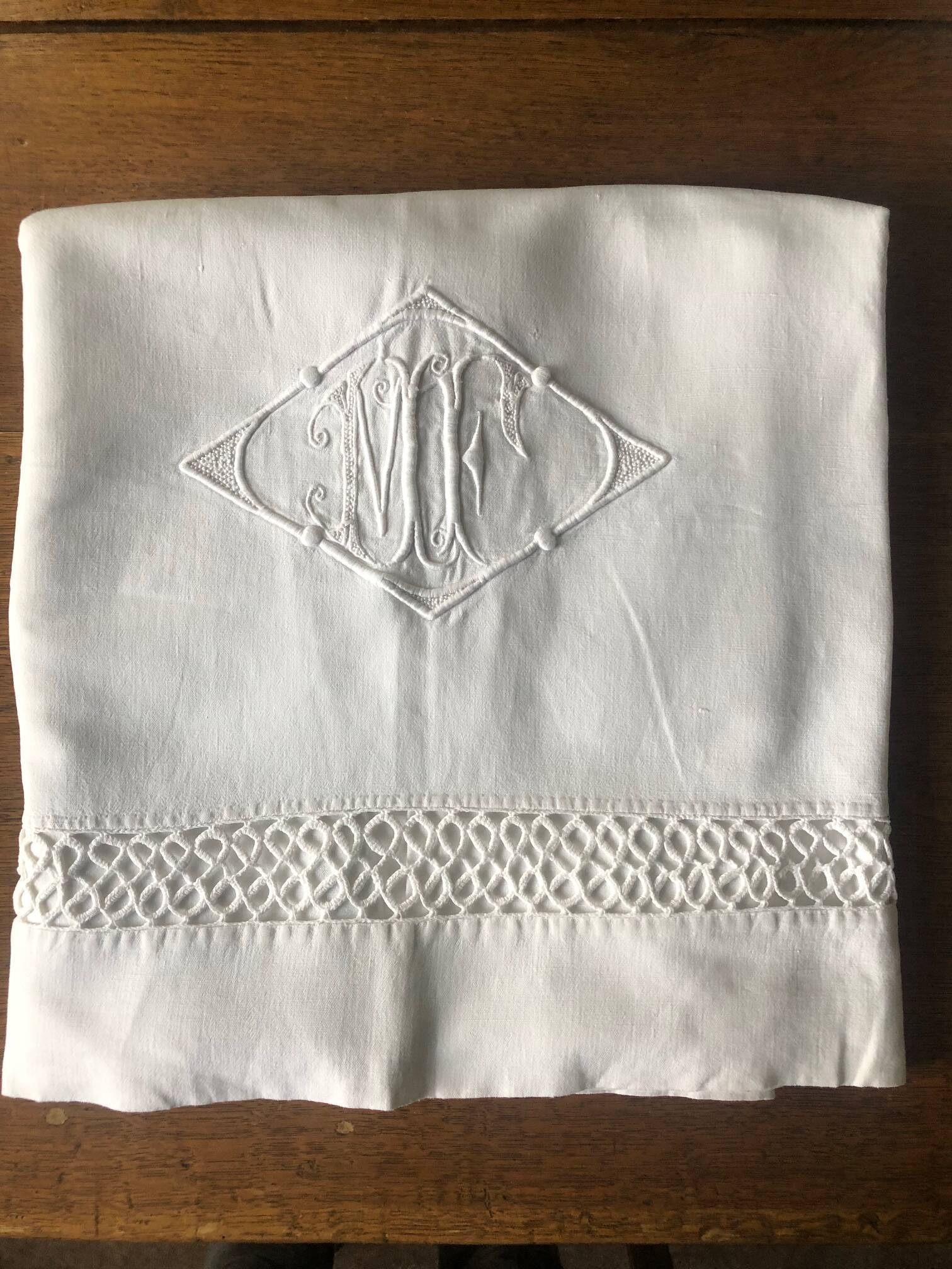 Similar listings: Antique cotton sheet embroidered with the monogram MF