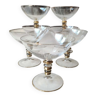 Art Deco champagne glasses 1950/In finely cut crystal. White lines/Gold trim patterns. Ring rod