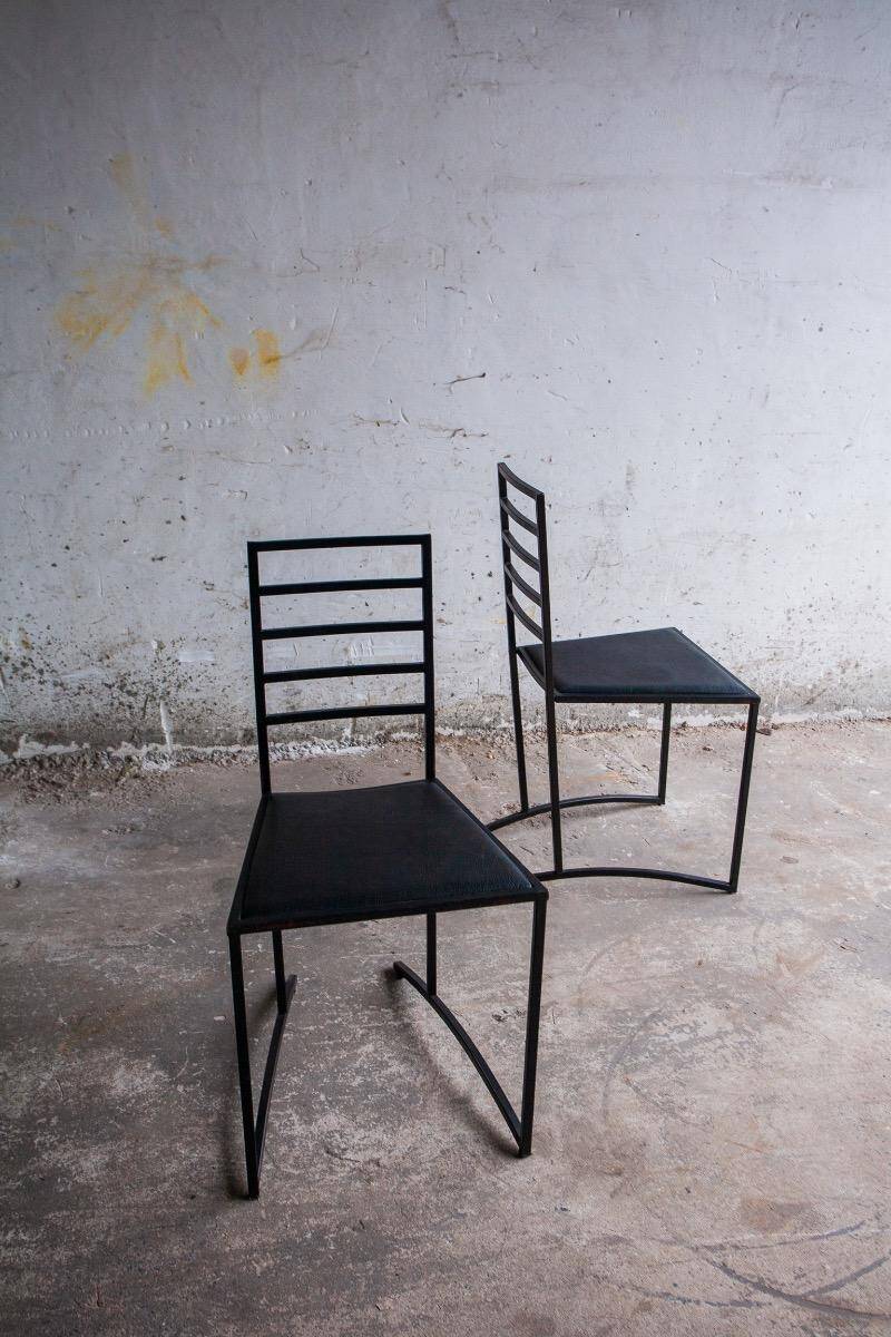 Set of 4 Black Steel Dining Chairs with Black Faux-Leather Seats — Minimalist Geometric Design