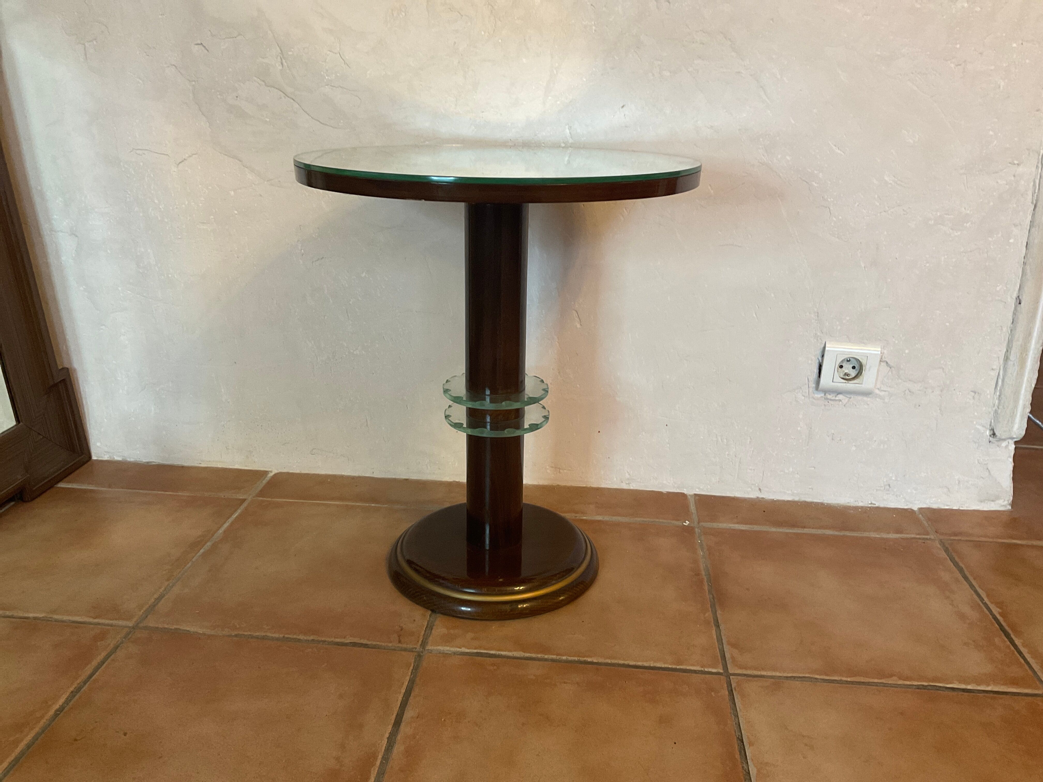 Vintage pedestal table design mirror glass and brass