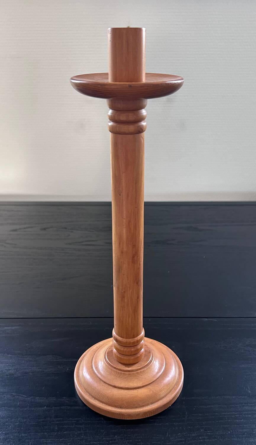 Blond wooden candle holder