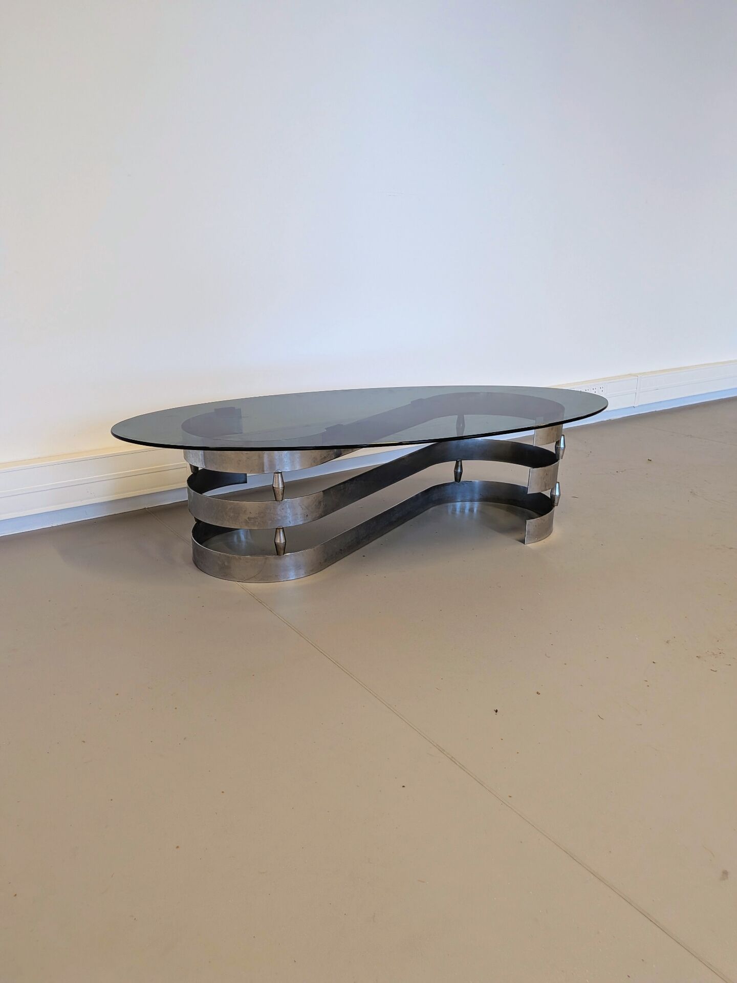 Vintage coffee table in smoked glass designed by Knut Hesterberg.