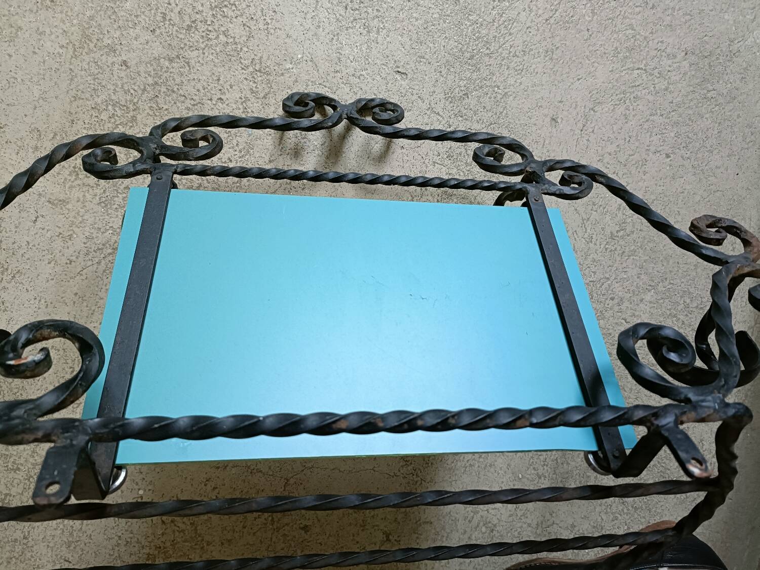 Twisted wrought iron wall-mounted coat rack